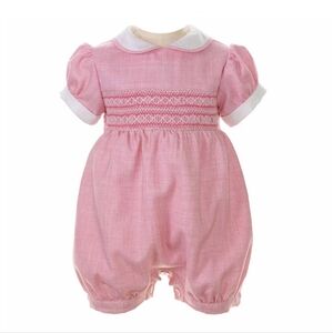 Rachel Riley Pink Geometric Smocked Babysuit